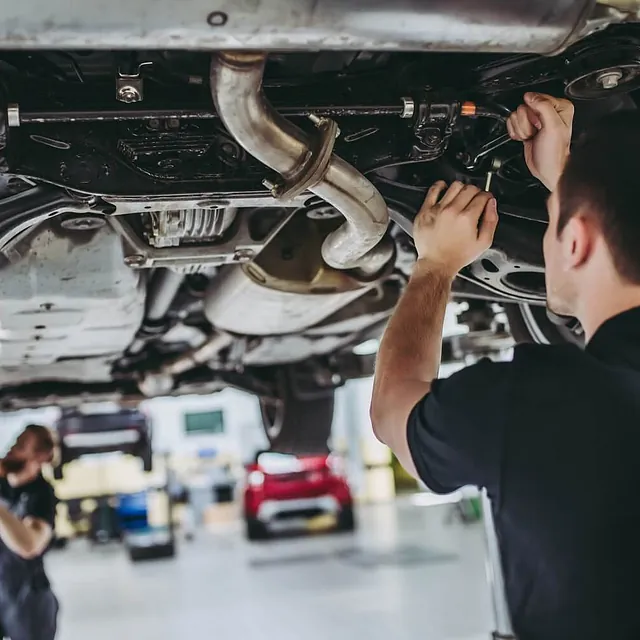 Mechanic performing a service